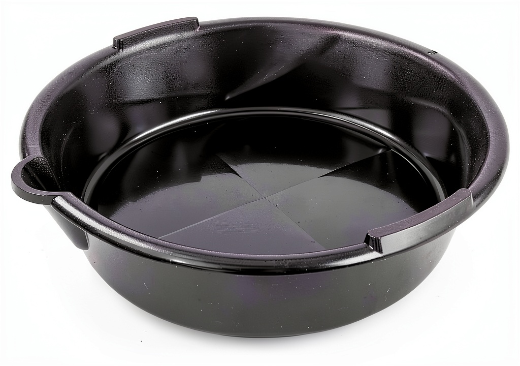 JEGS drain pan being used to collect engine oil in a garage