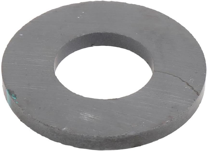 Installing GM Genuine Parts Transmission Magnet on a wooden workbench